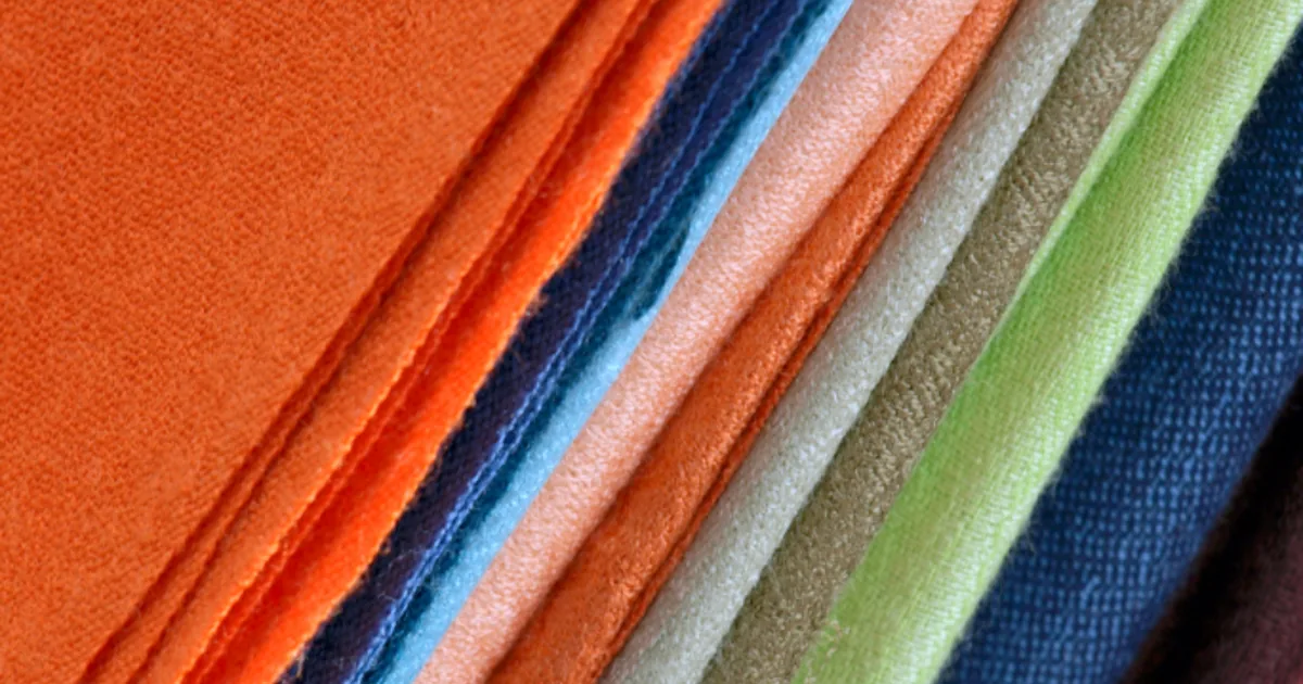 A grid of fabric swatches in neutral and accent tones