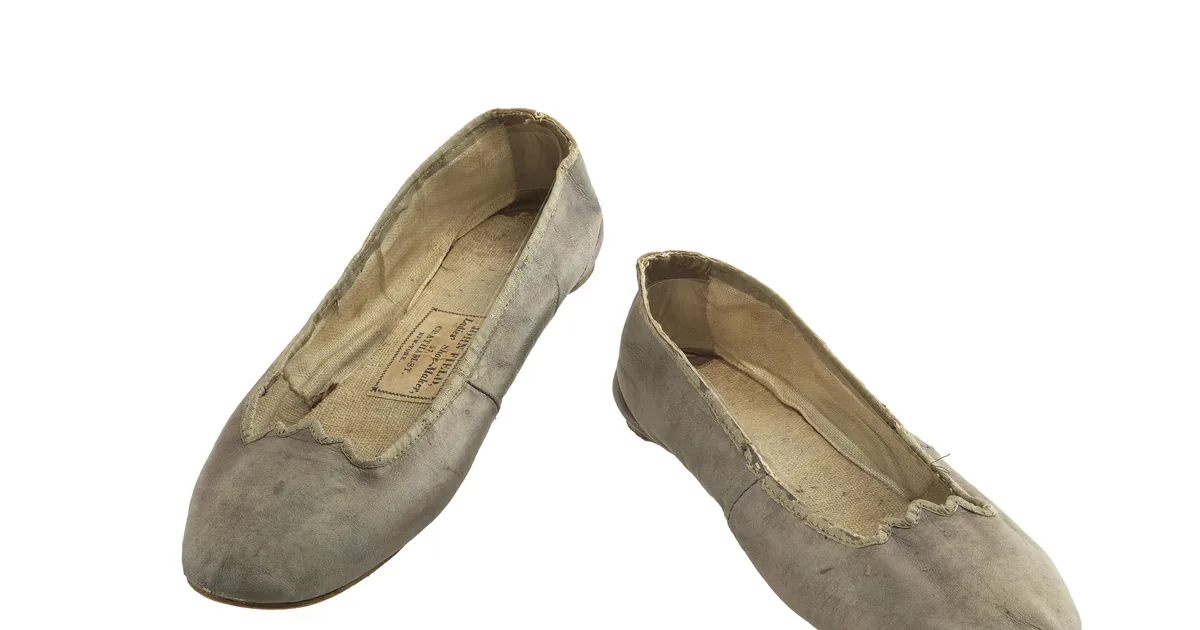 A pair of brown leather men's dress shoes